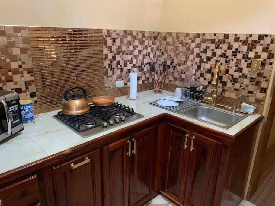 Banyan Rose Apartment Orange Walk Town Ngoại thất bức ảnh